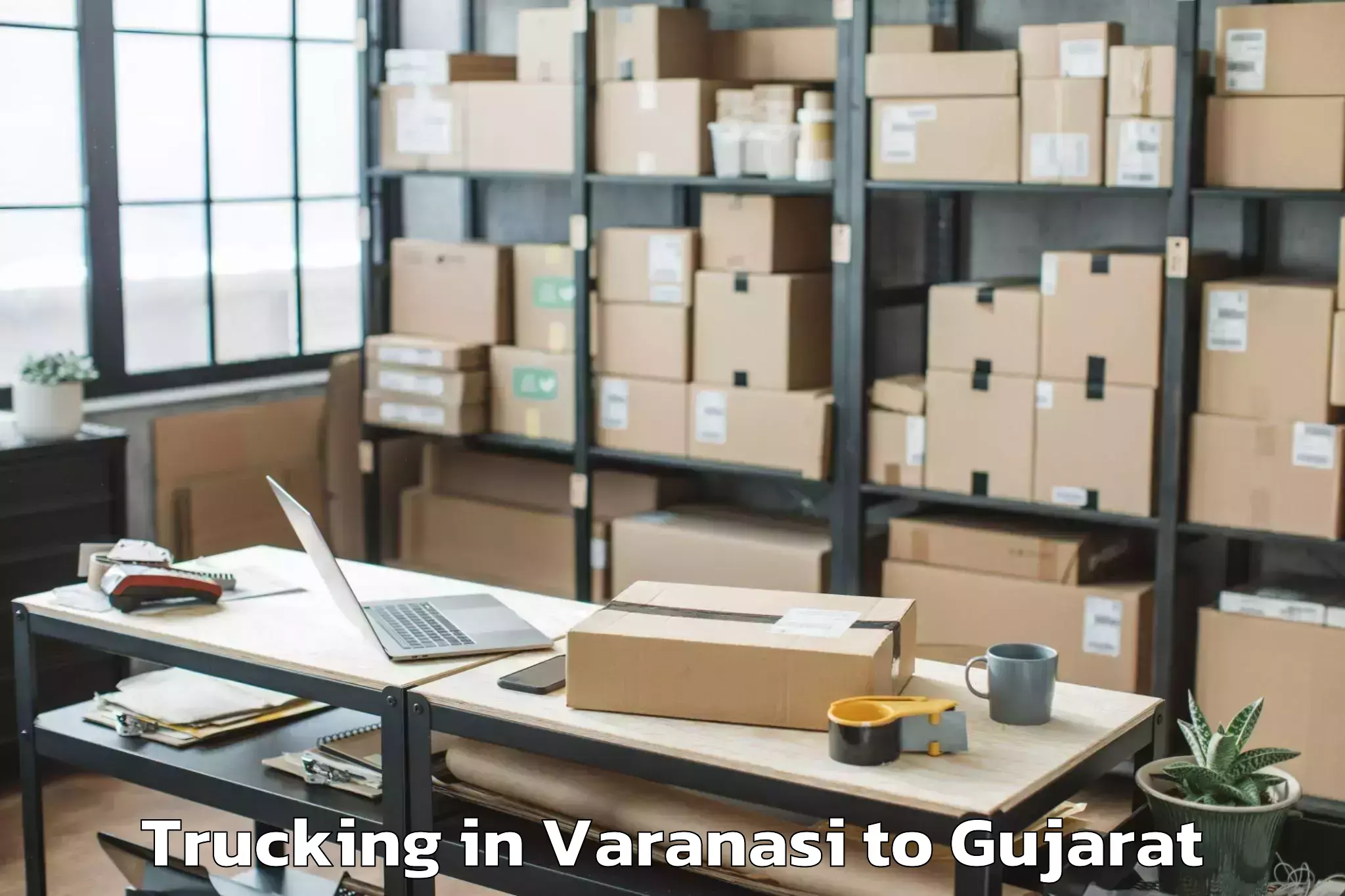 Top Varanasi to Gujarat University Of Transpla Trucking Available